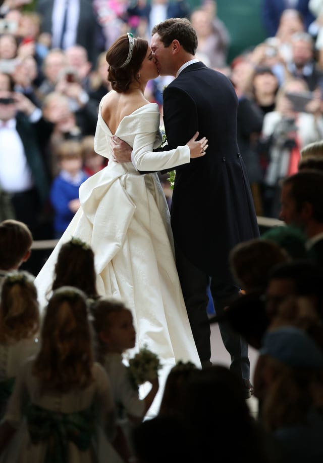 Princess Eugenie and her new husband Jack Brooksbank kissing 