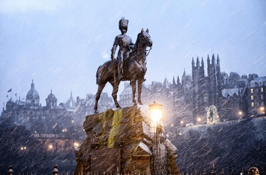 The Royal Scots Greys Monument on Edinburgh's Princes Street gets a covering of snow on Boxing Day morning (26.12.16)
